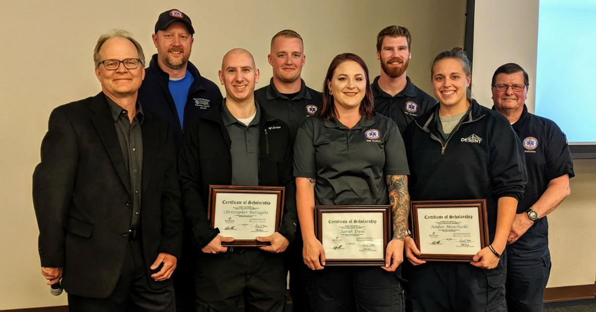 EMS students from NWTC pose with Dr. Christopher Sorrells of BayCare Clinic