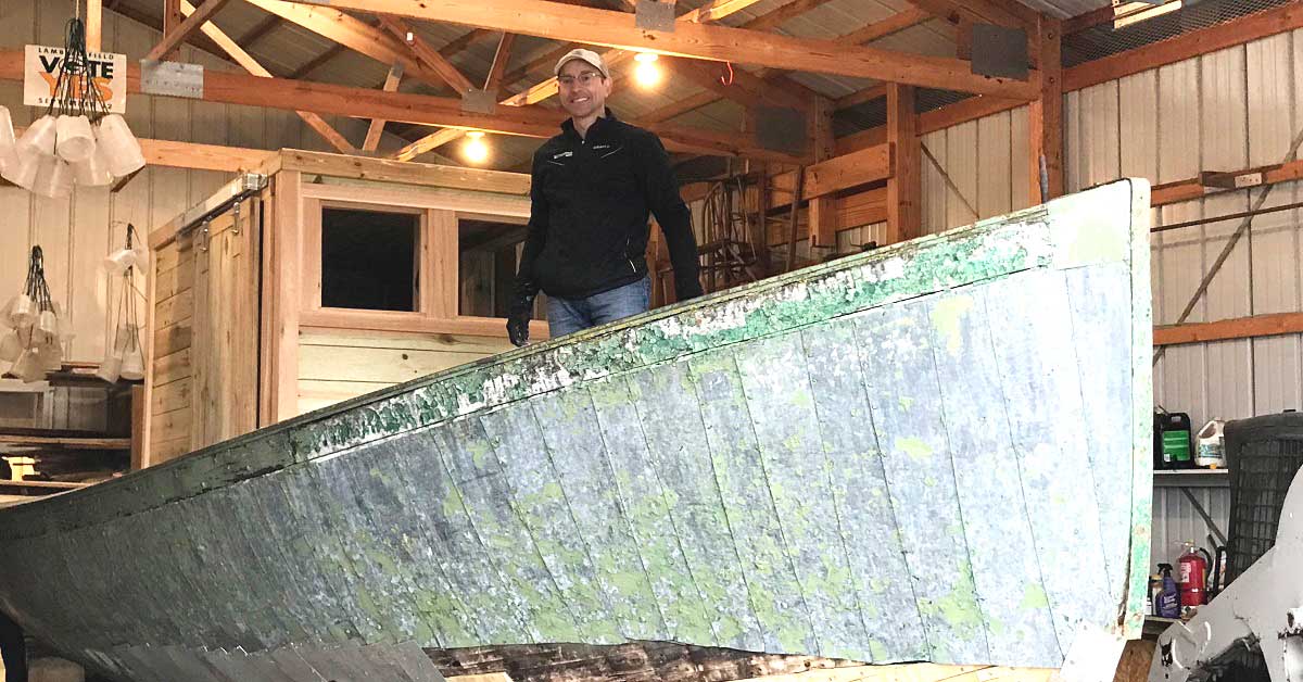 Dr. Jon Henry poses near one of his restoration projects