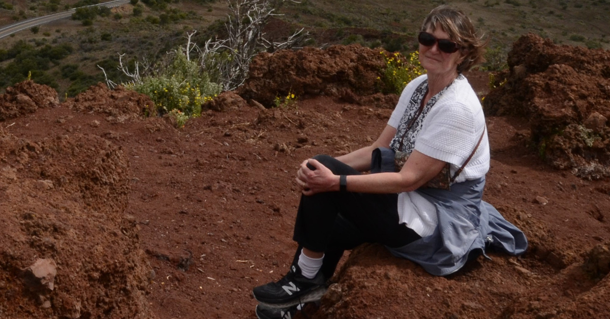 Felicia (woman) on hill while hiking