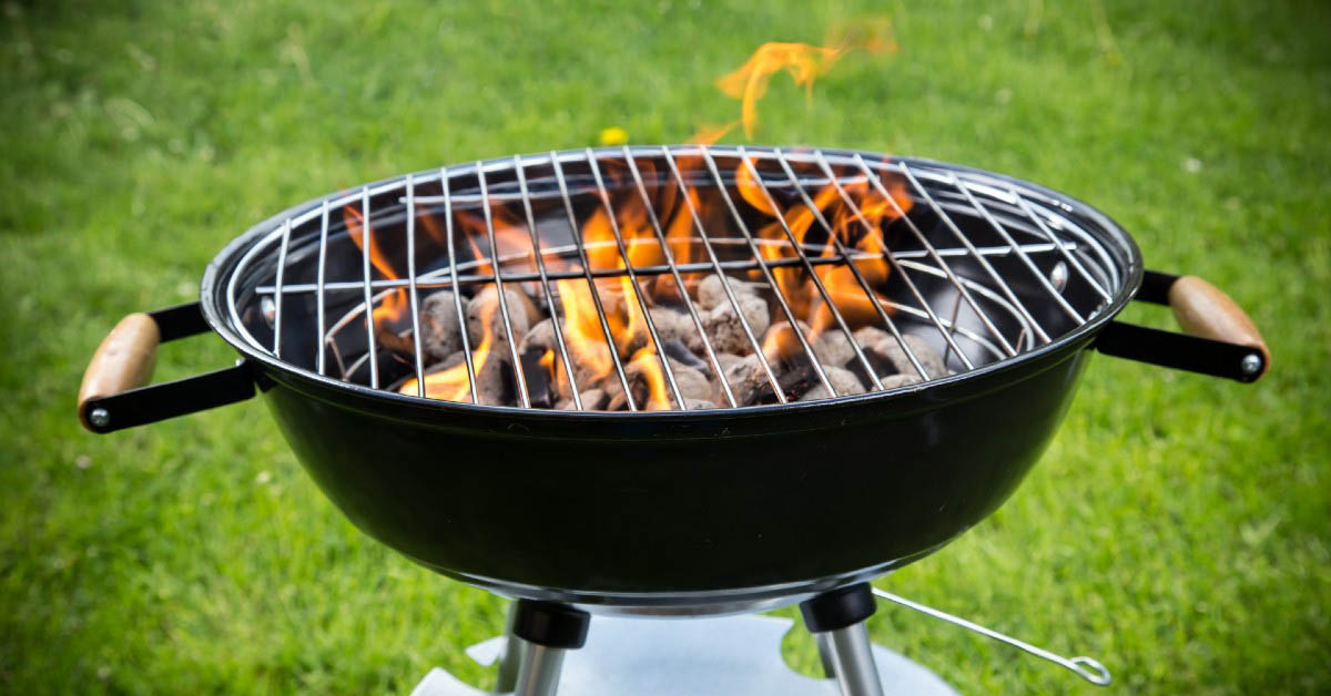 Charcoal grill with flames